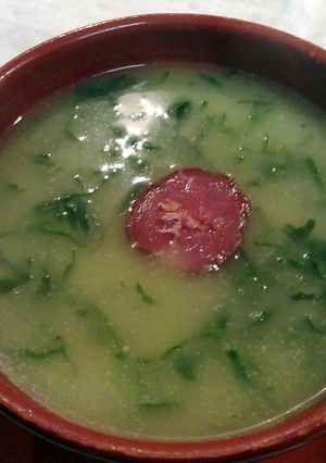 A picture of kale soup with chorizo (portuguese caldo verde).