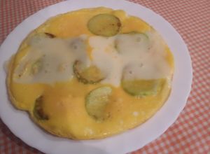 Una foto de Tortilla de calabacín y tranchetes