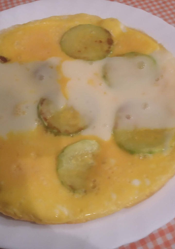 Una foto de Tortilla de calabacín y tranchetes