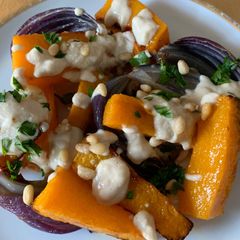 Roasted Butternut Squash and Red Onions with Tahini sauce A picture of Roasted Butternut Squash and Red Onions with Tahini sauce.