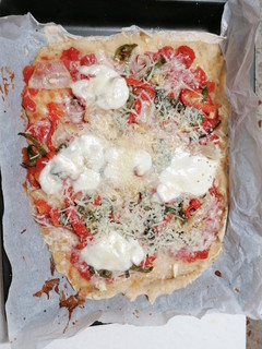Una foto de Pizza casera al estilo de la gata