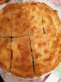 Torta salata con scarola salsiccia olive e acciughe
