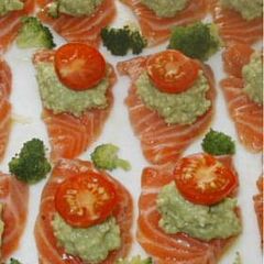 A picture of Salmon Sashimi with Avocado Dip.