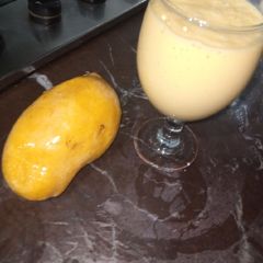 A picture of Mango shake 🥭🍺.