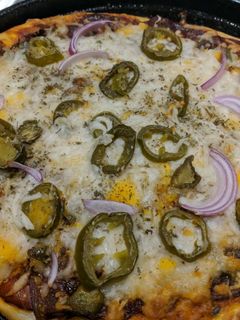 صورة لوصفة بيتزا لذيذة