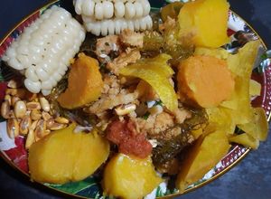 Una foto de Ceviche con camotes bañado en jugo de naranja