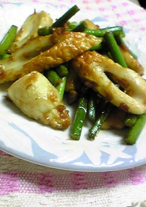 A picture of Delightful Chikuwa Fishcake Sticks and Garlic Shoots Sautéed in Butter.