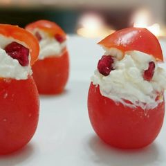 A picture of Tomato And Cheese Santa Appetizer.