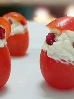A picture of Tomato And Cheese Santa Appetizer.