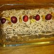 Postre tronco de mousse de chocolate, cerezas y frutos secos