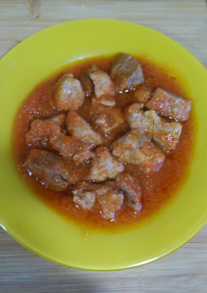 Una foto de Magro con tomate