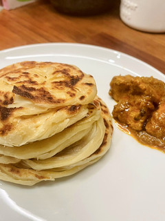 A picture of Roti Canai or Parotta.