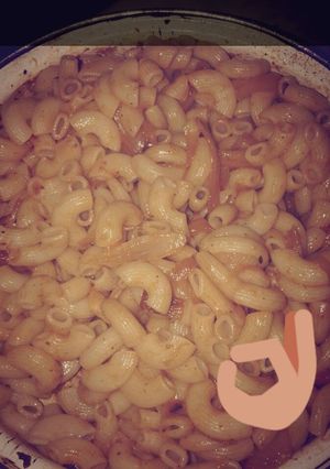 Una foto de Fideos con cebolla