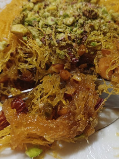 A picture of Kataifi in the Pan with Walnuts, Almonds, and Pistachios.