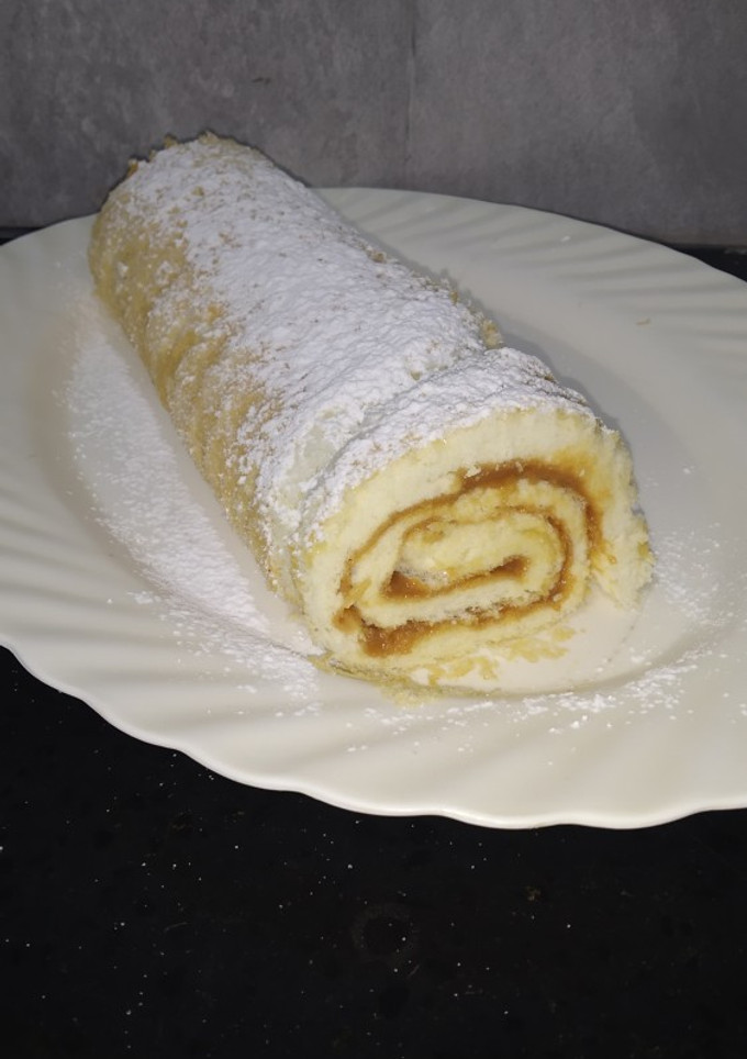 Una foto de Arrollado sin gluten con dulce de leche