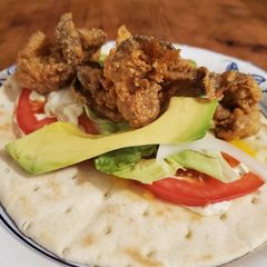 A picture of Brads oyster po boy wrap.