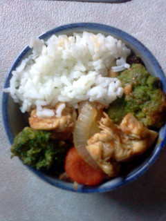 A picture of chicken and broccoli.