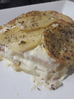 Una foto de Milhojas de papa con jamón y queso