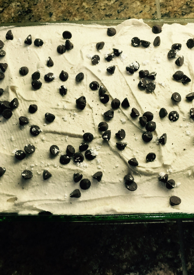 A picture of Cannoli Poke Cake.