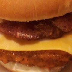 A picture of Buffalo chicken bacon sandwich with cheddar jack cheese.