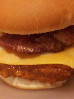 A picture of Buffalo chicken bacon sandwich with cheddar jack cheese.