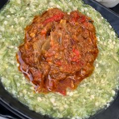 A picture of Okro soup with sauce.