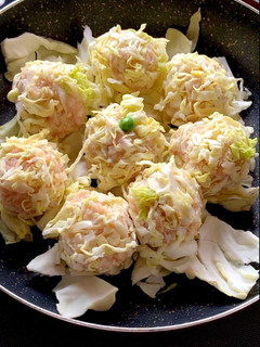A picture of Chicken and Fish Cake Shumai Wrapped in Cabbage.