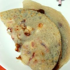 A picture of An Osaka Specialty: Ika-yaki (Squid Pancakes).
