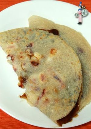 A picture of An Osaka Specialty: Ika-yaki (Squid Pancakes).