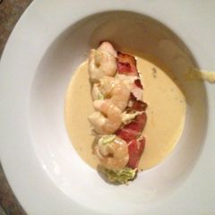 A picture of Chicken Stuffed With Avo And Philly With Creamy Garlic Sauce.