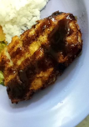 A picture of Pork Tonkatsu with Buttered Vegetables.