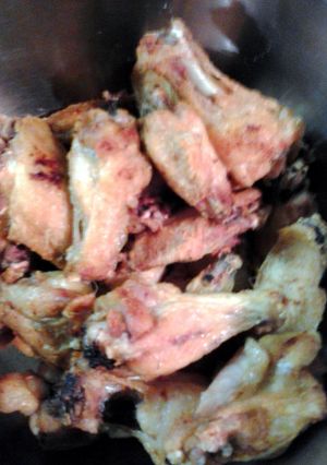 A picture of wings in ghee.