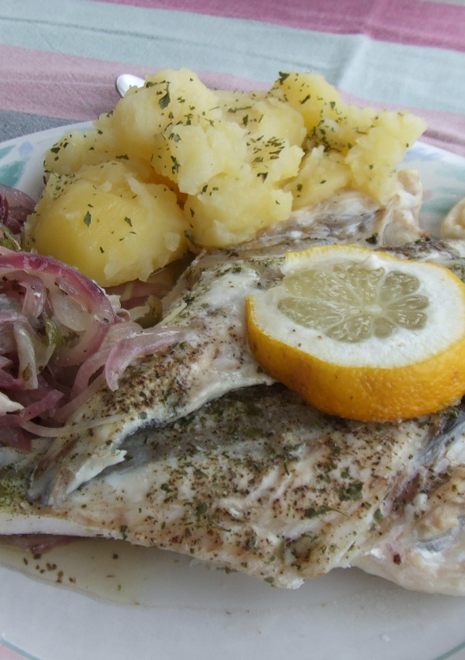 Una foto de Pescado de ración horneado