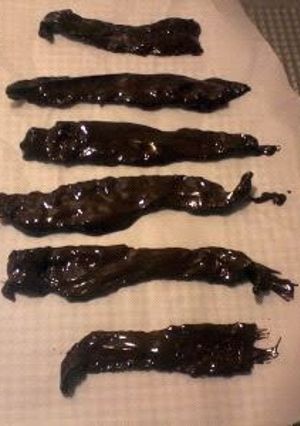 A picture of DARK CHOCOLATE COVERED BACON.