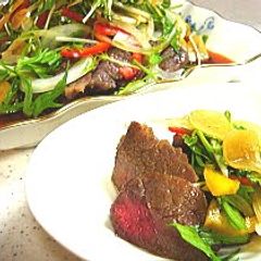 A picture of Steak With Lots of Vegetables- Wasabi Garlic Sauce.