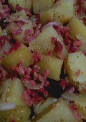 Foto principal de Salteado de patata con jamón y tomate seco