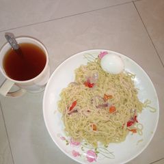 A picture of Indomie with goruba tea.