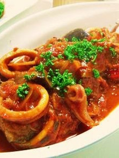 A picture of Squid and Eggplants in Tomato Sauce.