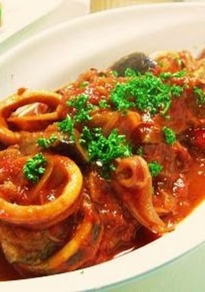 A picture of Squid and Eggplants in Tomato Sauce.