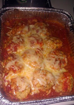 A picture of Chicken balls in tomato sauce.