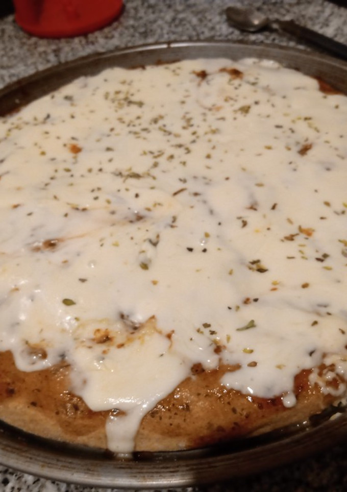 Una foto de Pizza de harina integral