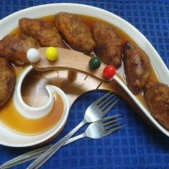 A picture of Ranga Aloor Rosomoti or Fried Sweet Potato Dumplings.