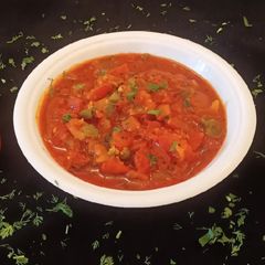 A picture of Tomato and Green Chillies Sabji.