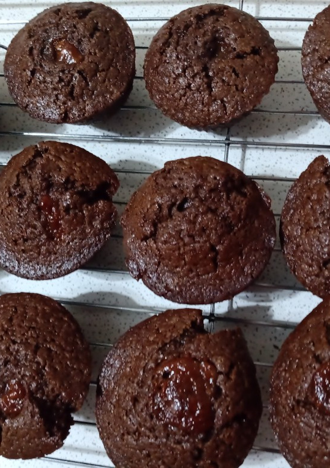 Una foto de Muffins de chocolate, dulce de leche y yogurt