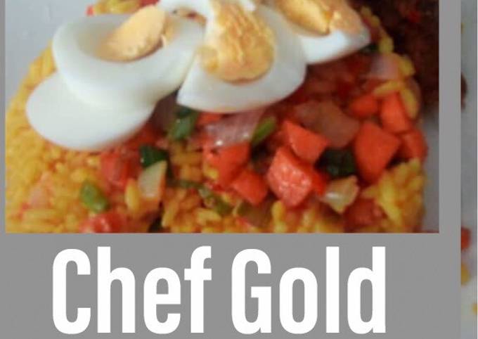 Turmeric rice garnished with veggies and boiled eggs