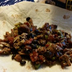 A picture of Smoked pork tacos.