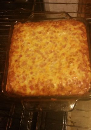 A picture of Tomatoes, ham quiche.