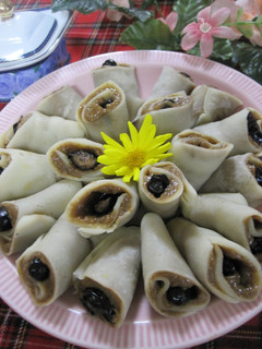 A picture of Chewy Black Bean & Coffee Cream Rolls.