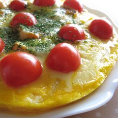 A picture of Omelette with Lots Of Onions and Salmon.