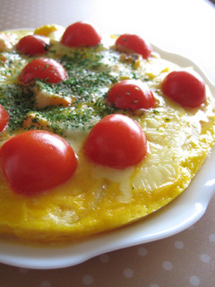 A picture of Omelette with Lots Of Onions and Salmon.